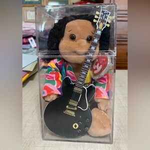 TY beanie kid NWT Calypso born 6/28/1997 with black Gibson guitar